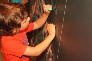 Josh writing Shalom